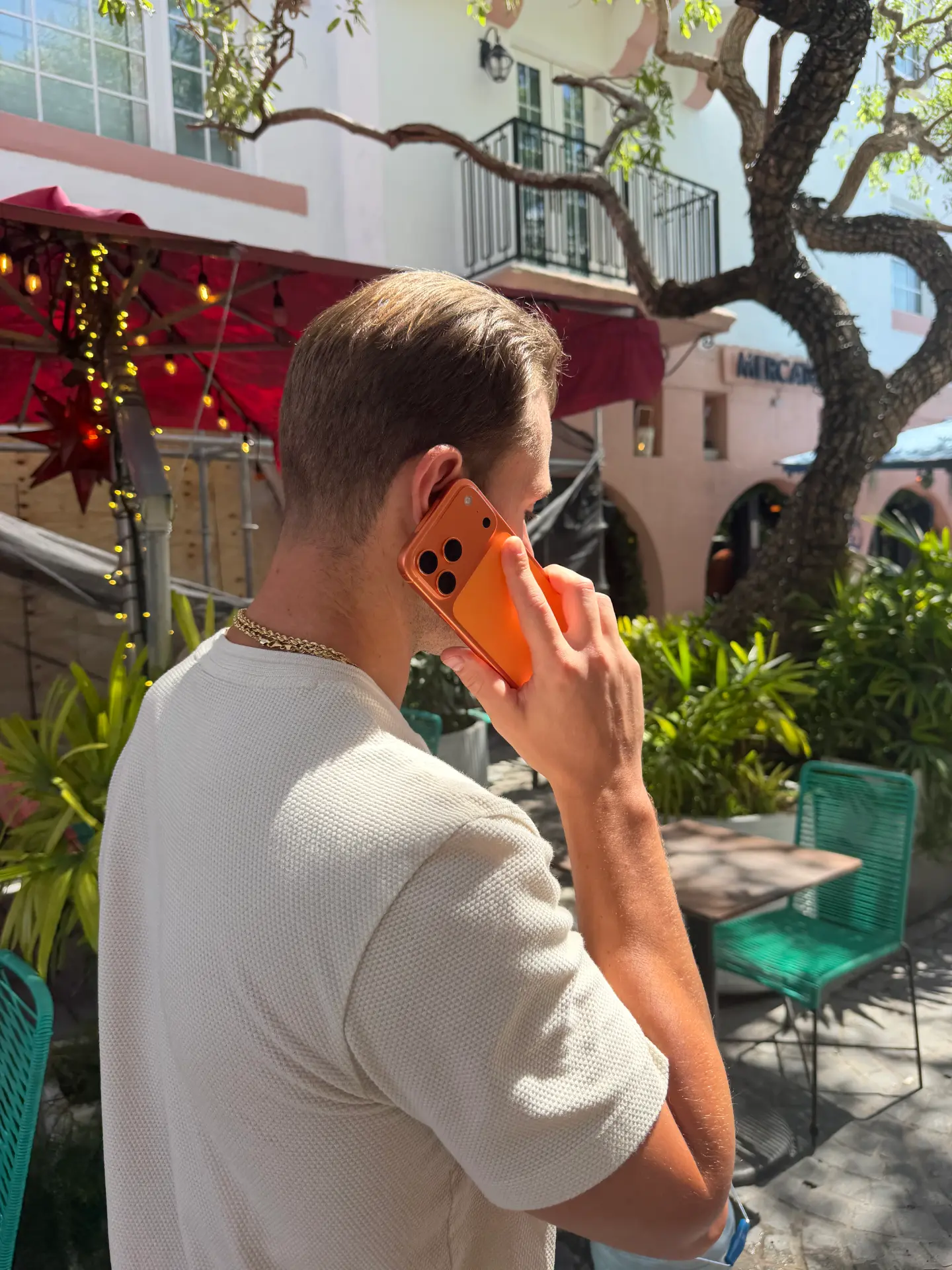 Cole DeFranco taking a client call outdoors